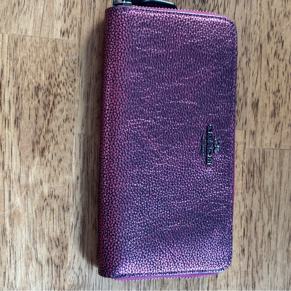 Coach slim accordion zip wallet.